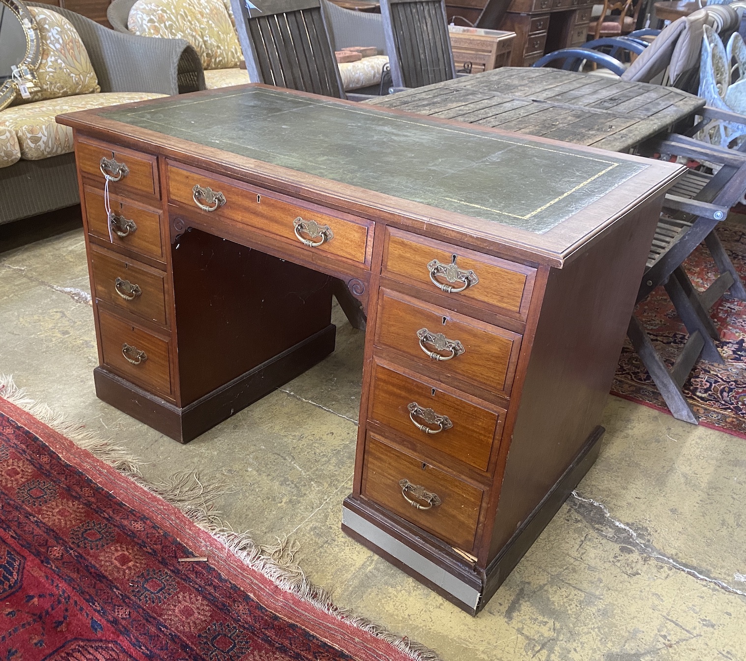 A late Victorian mahogany kneehole desk, length 122cm, depth 68cm, height 77cm